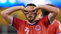 McGinn straalt van trots na historische WK-zege voor Schotland McGinn straalt van trots na historische WK-zege voor Schotland (Picture by: ichef.bbci.co.uk)
