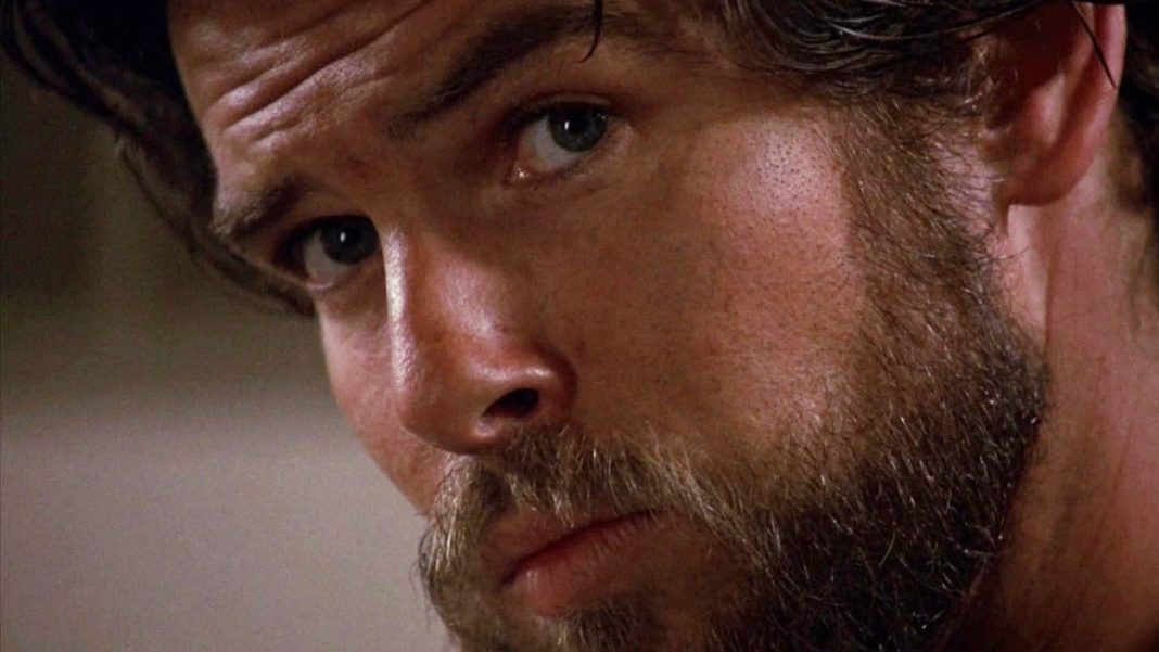 Legendarische actieregisseur begon zijn carrière met deze griezelige Pierce Brosnan-film (Picture by: slashfilm.com)